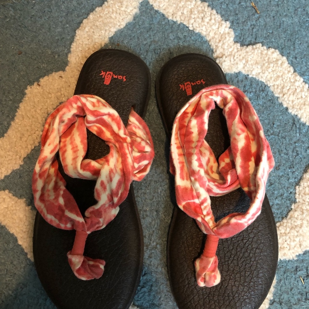 Pair of Sanuk sandals. Size 9.